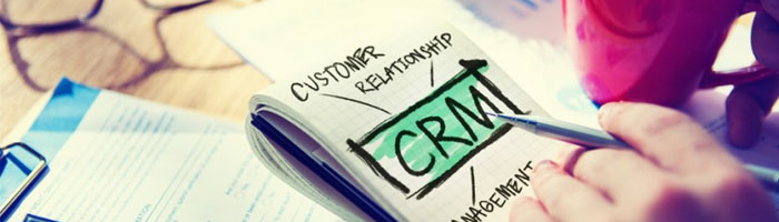 Componenten CRM uitgewerkt op een kladblok